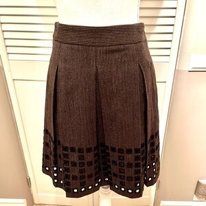 BCBGMAXAZRIA Wool blend skirt with embroidered square cutouts at hem box pleats